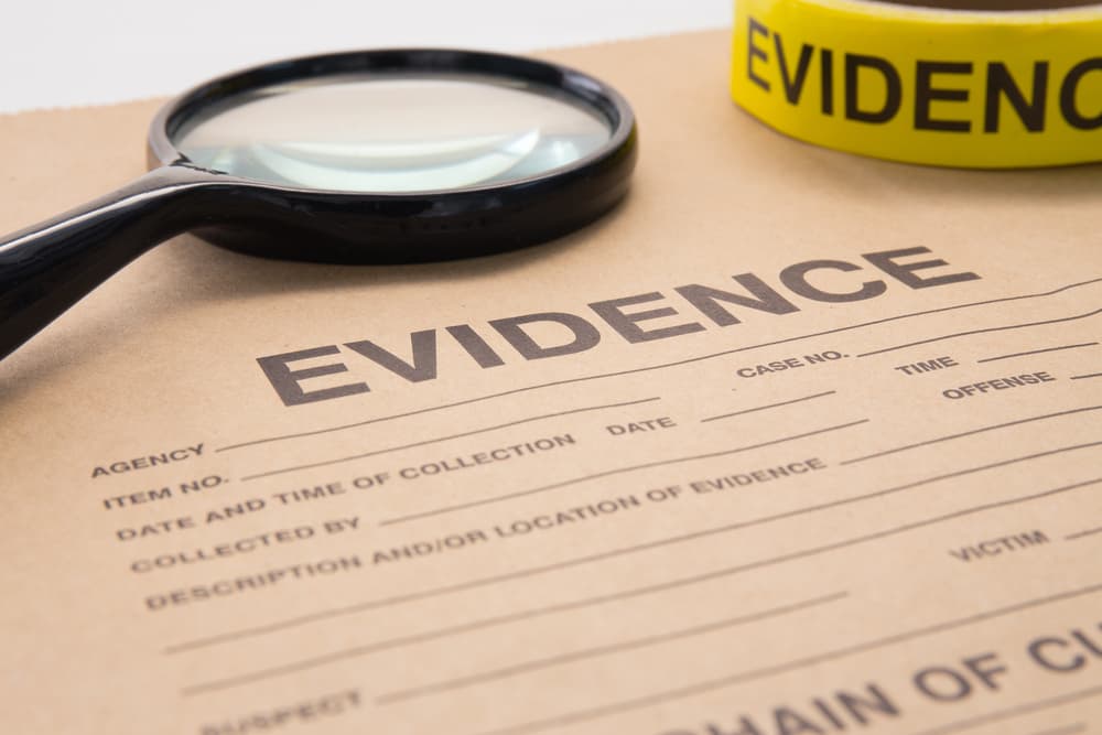 Evidence Bag and Magnifying Glass